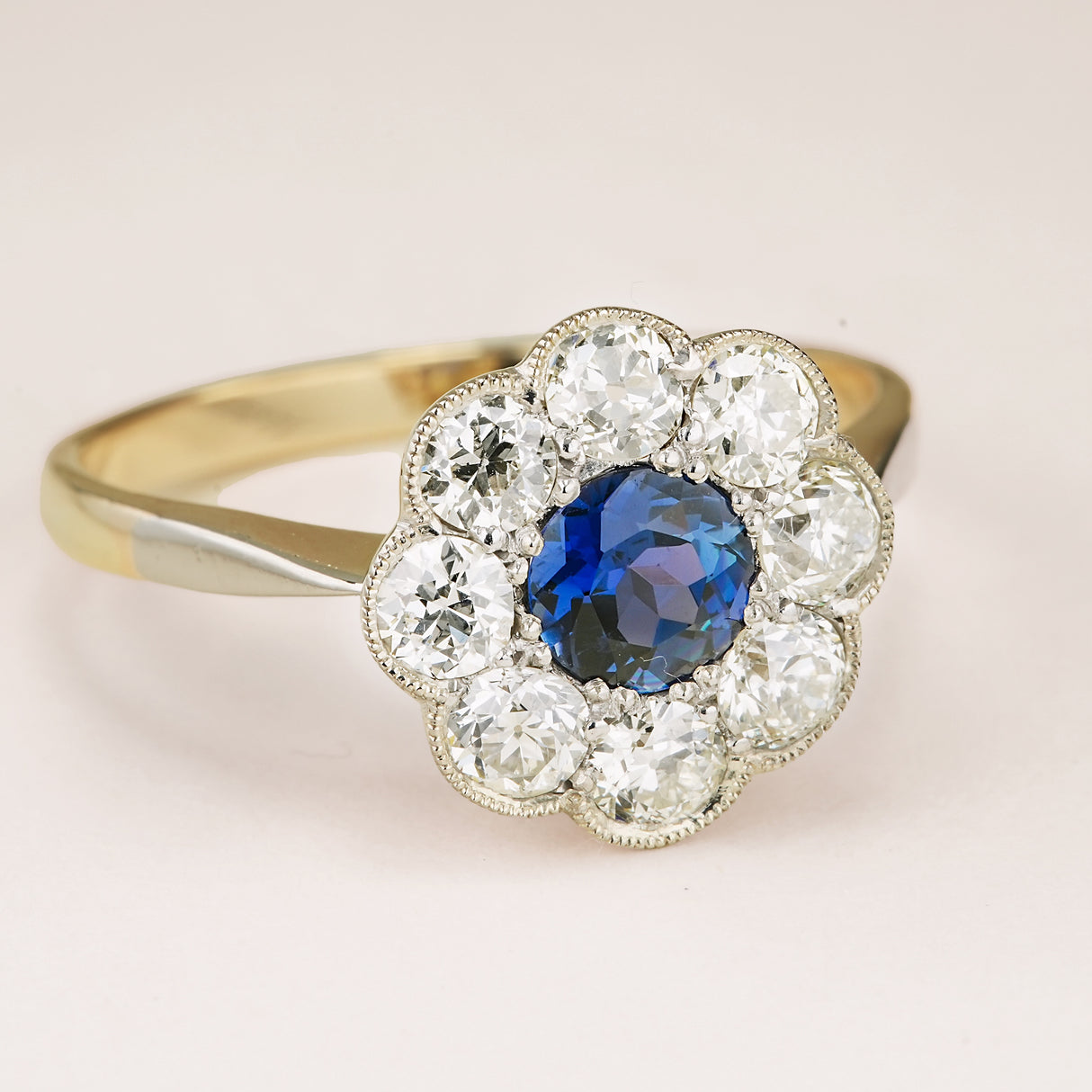 Antique, Edwardian sapphire and diamond daisy cluster ring
