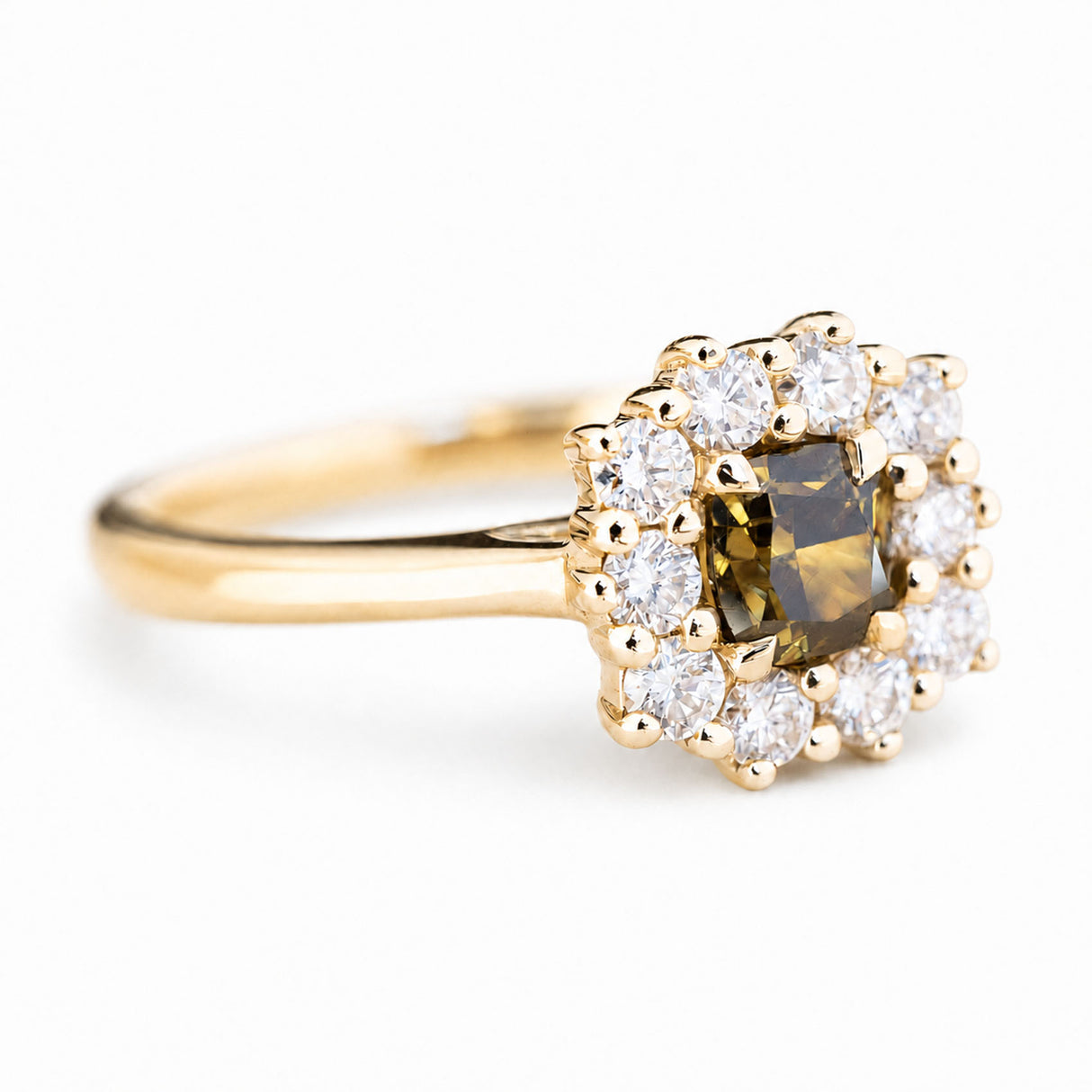 A three-quarter angle of an antique-inspired, Brown diamond halo cluster engagement ring in yellow gold.