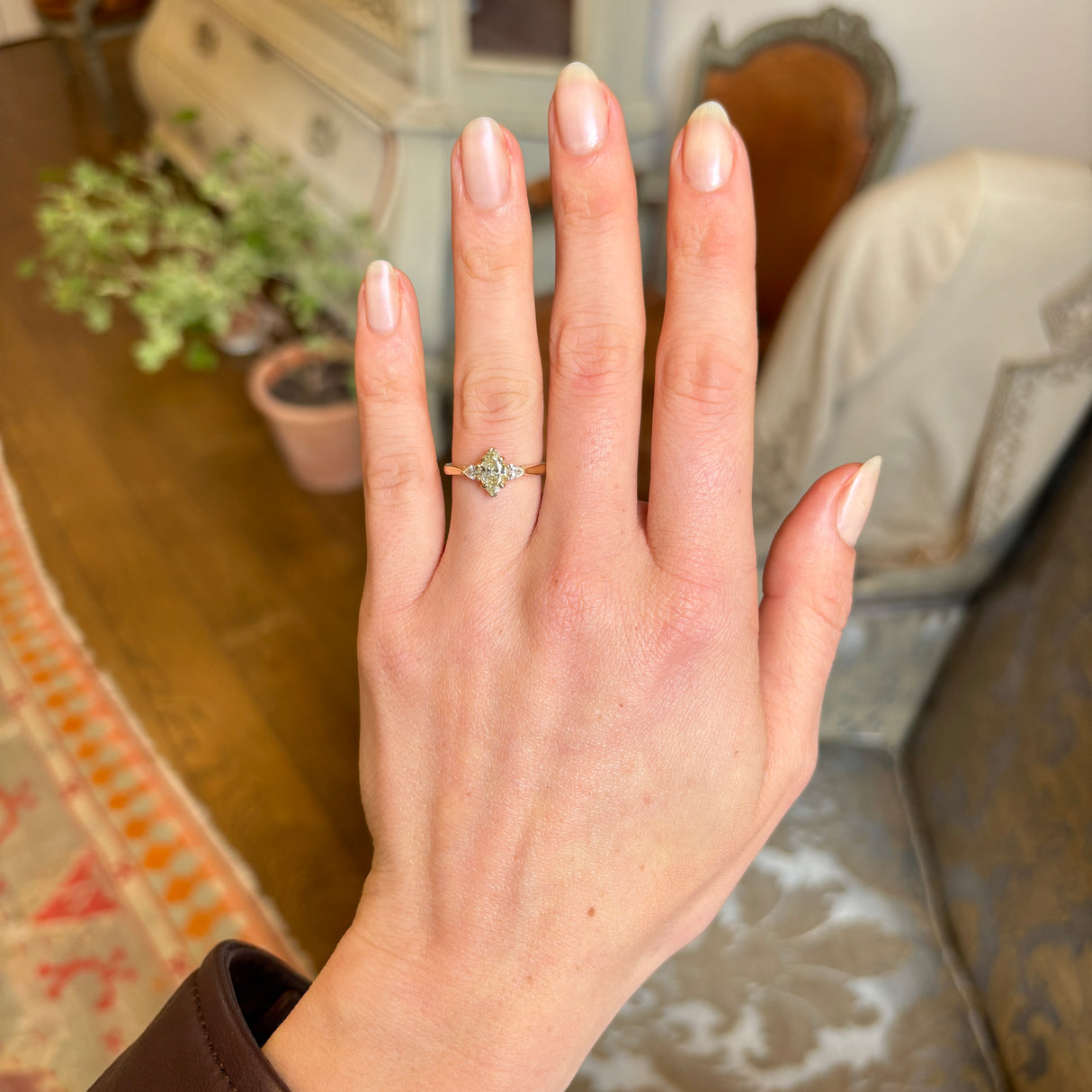 Marquise-cut diamond three-stone engagement ring