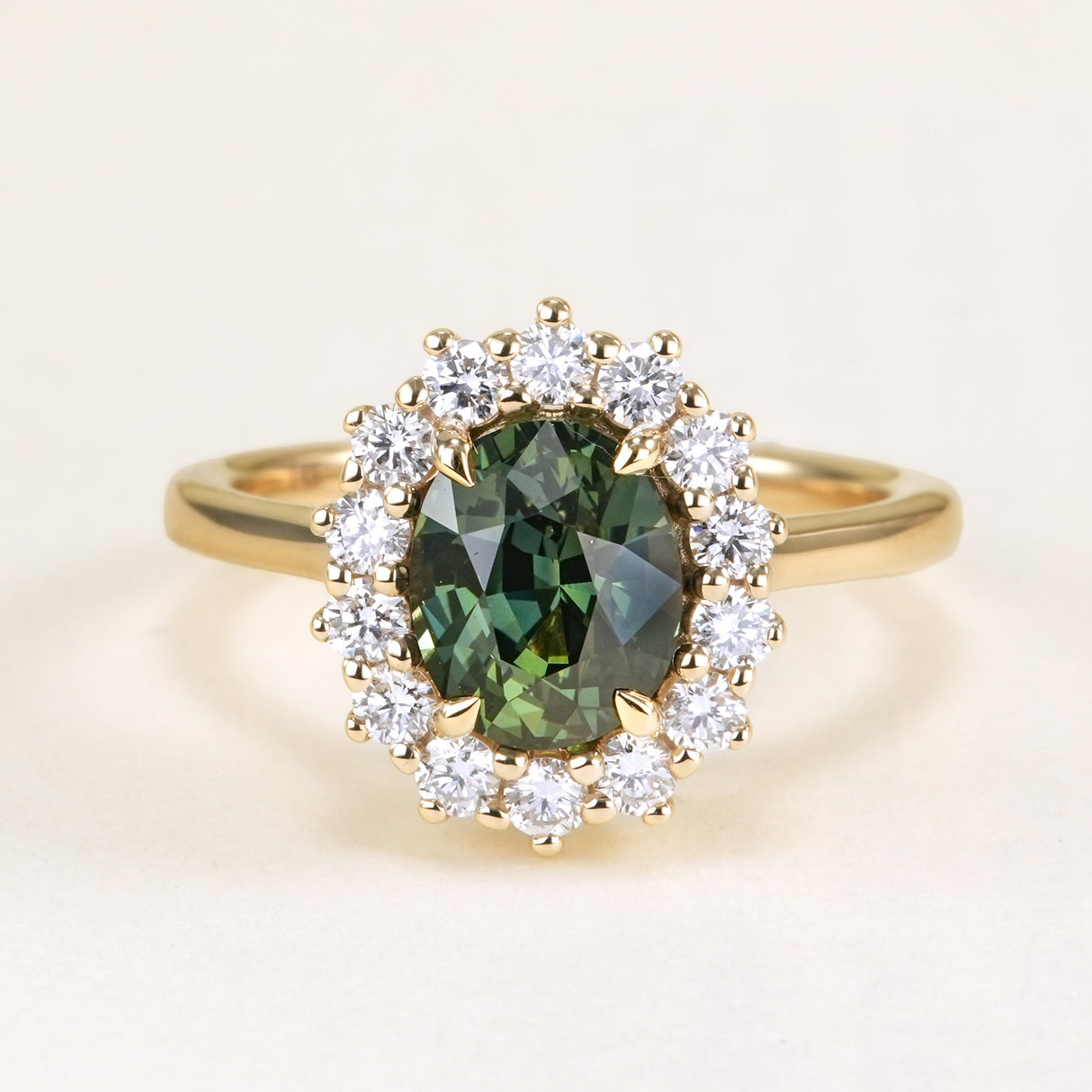 2.50ct oval-cut green sapphire & diamond cluster ring
