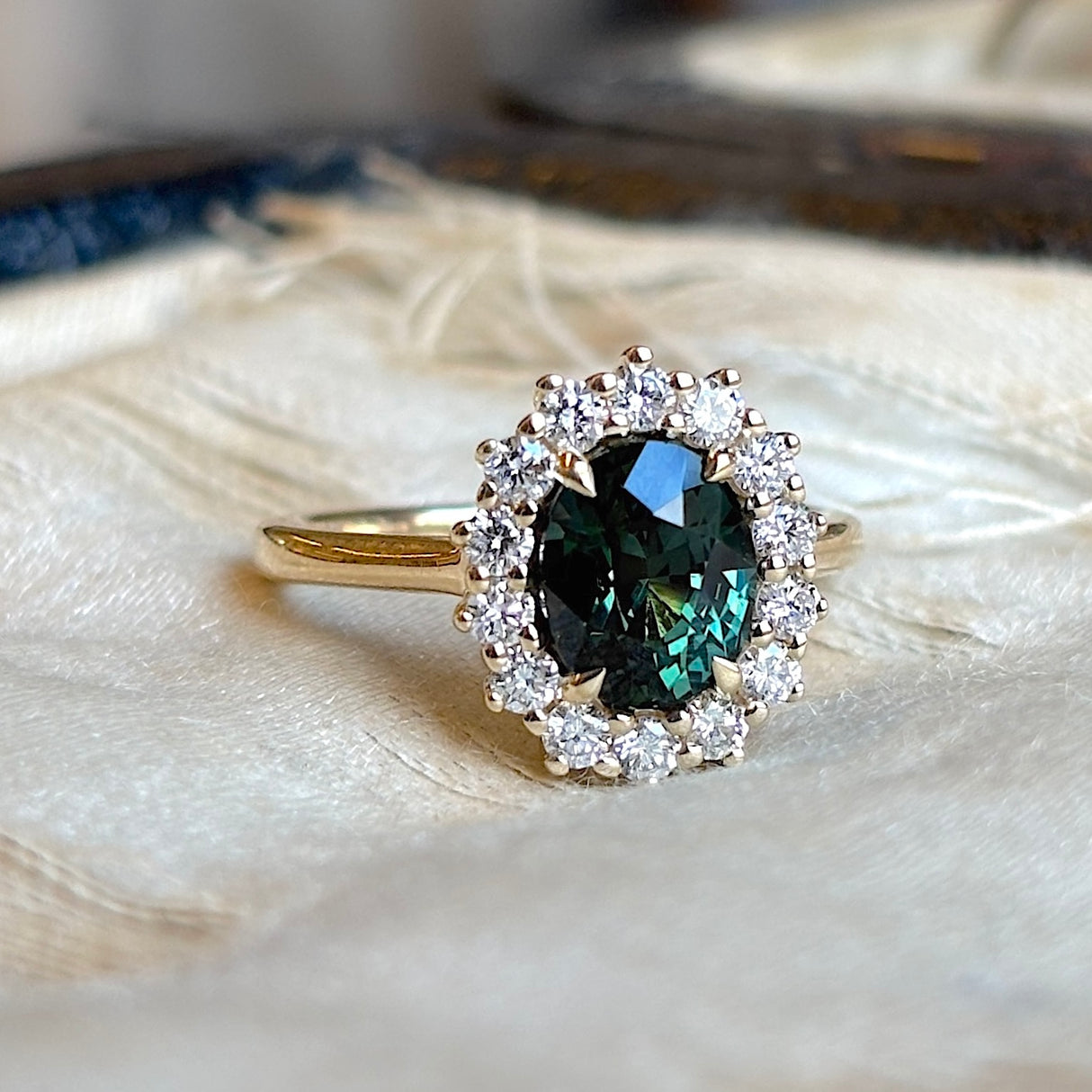 Teal sapphire & diamond cluster ring