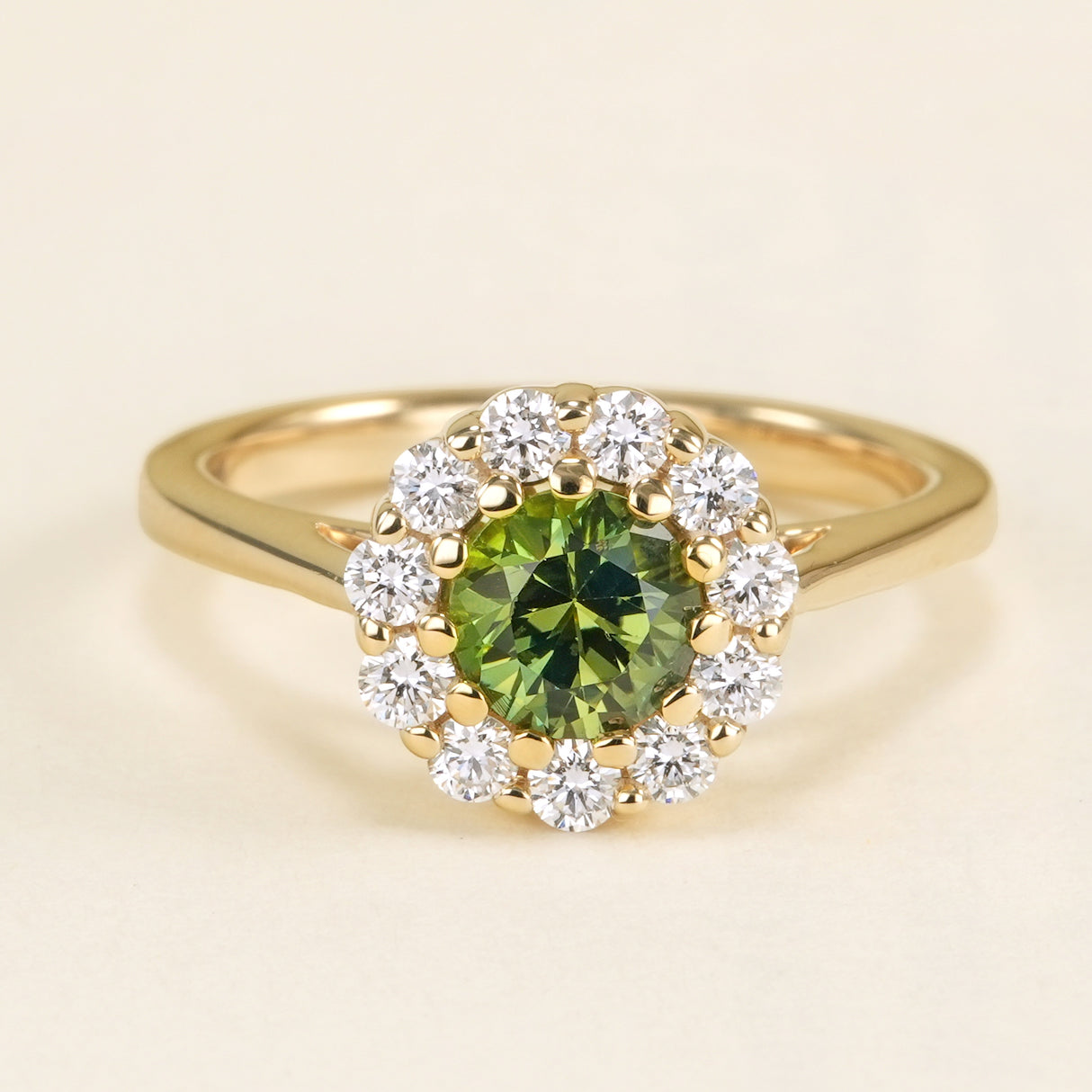 Green sapphire & diamond cluster engagement ring