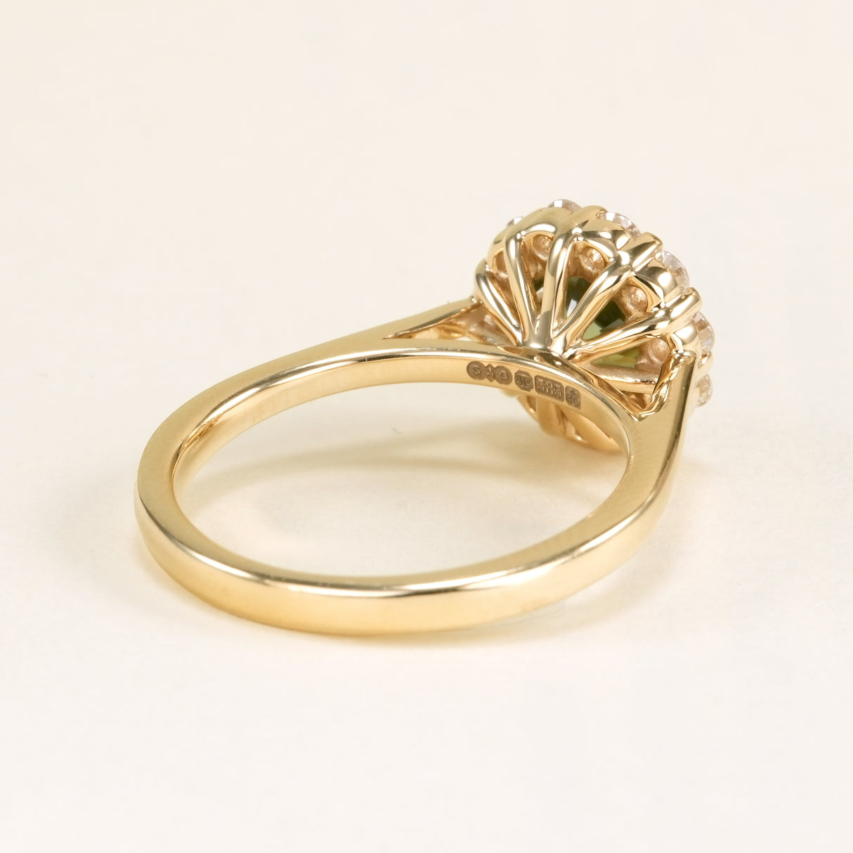 Green sapphire & diamond cluster engagement ring