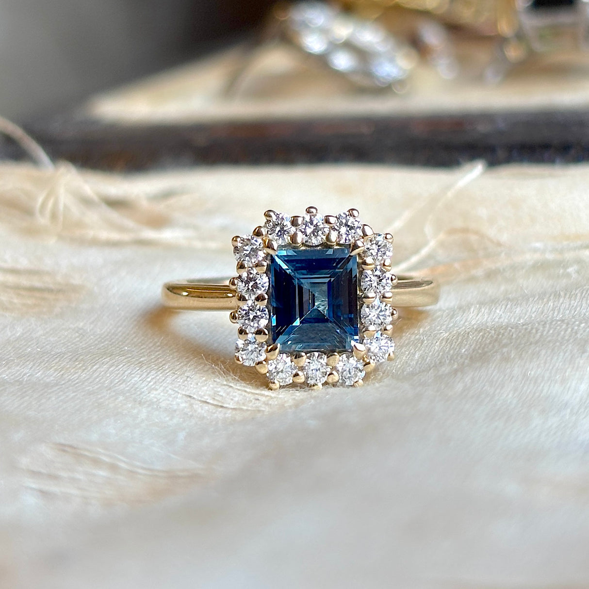 Baguette-cut teal sapphire & diamond cluster ring