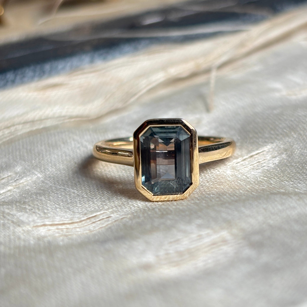 Teal sapphire single-stone ring