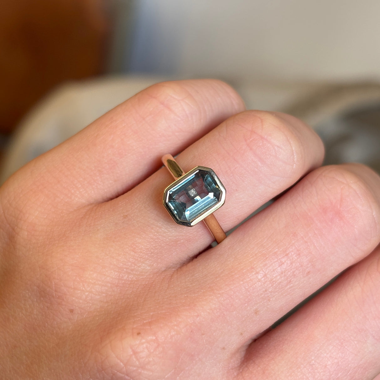 Teal sapphire single-stone ring
