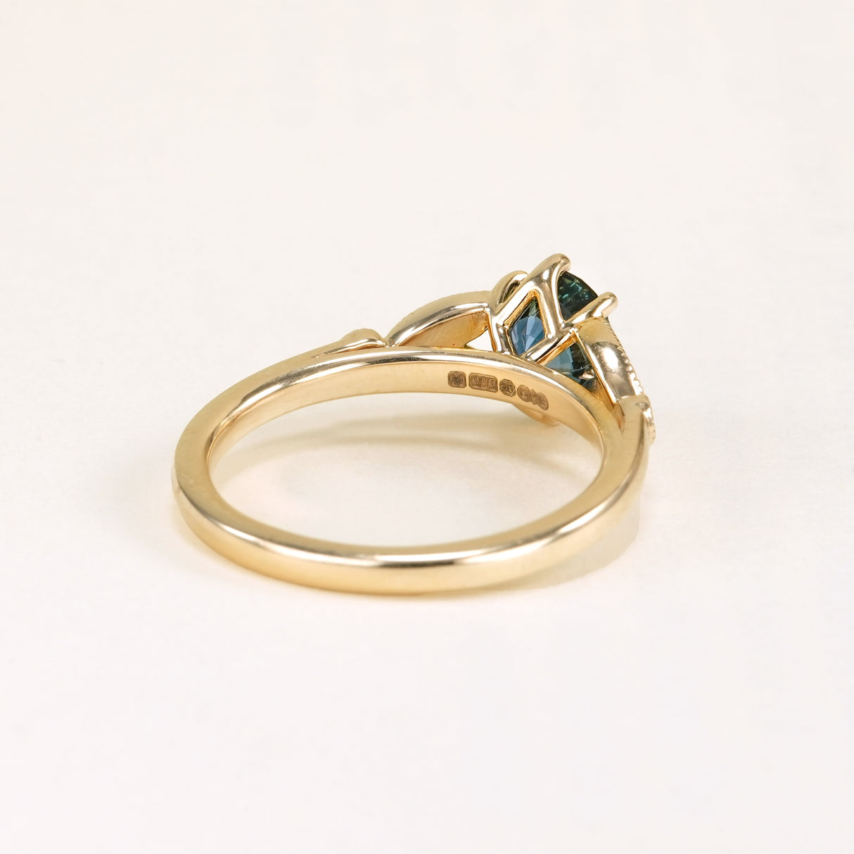 Deep blue sapphire and diamond engagement ring