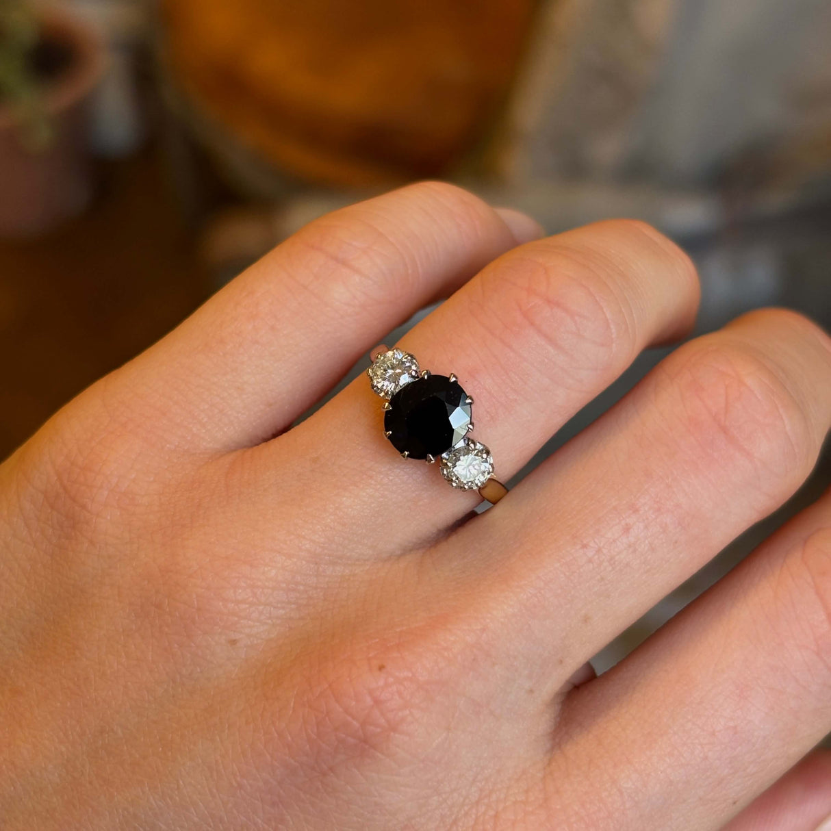 Vintage, 1950s dark blue sapphire and diamond three-stone engagement ring
