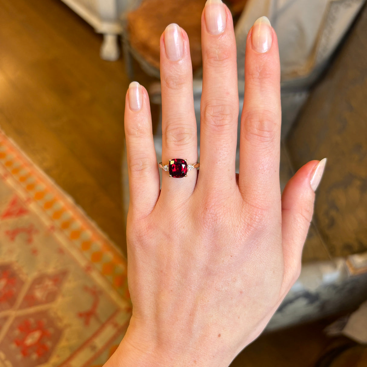 Ruby and diamond three-stone engagement ring