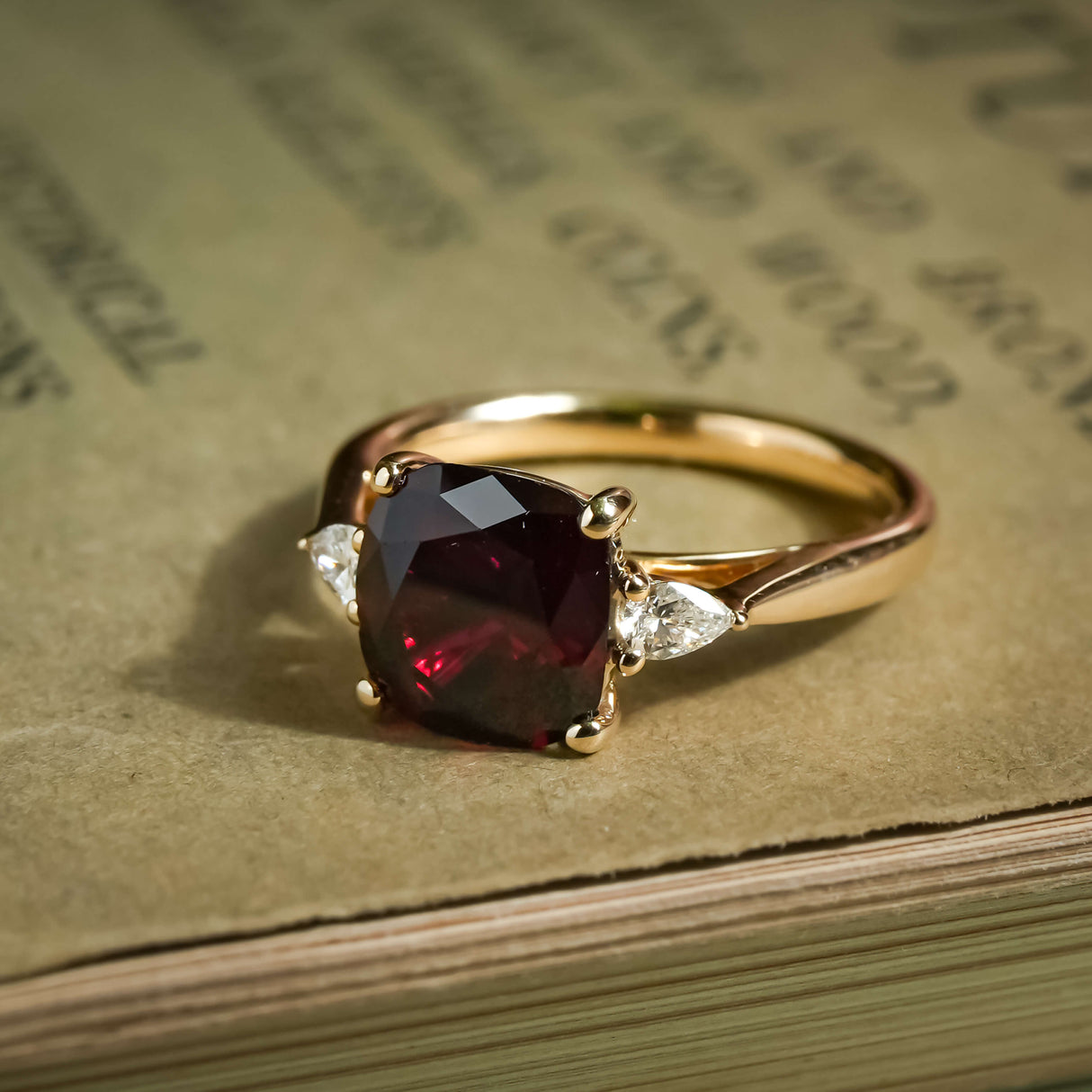 3ct ruby and diamond three stone engagement ring in yellow gold setting
