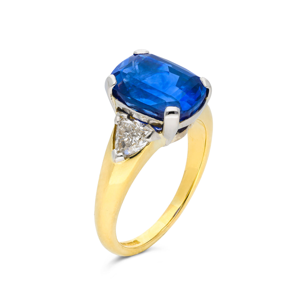Sapphire and diamond engagement ring, side view.