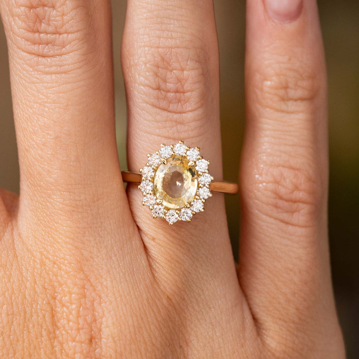 Antique-inspired, yellow sapphire and diamond cluster engagement ring