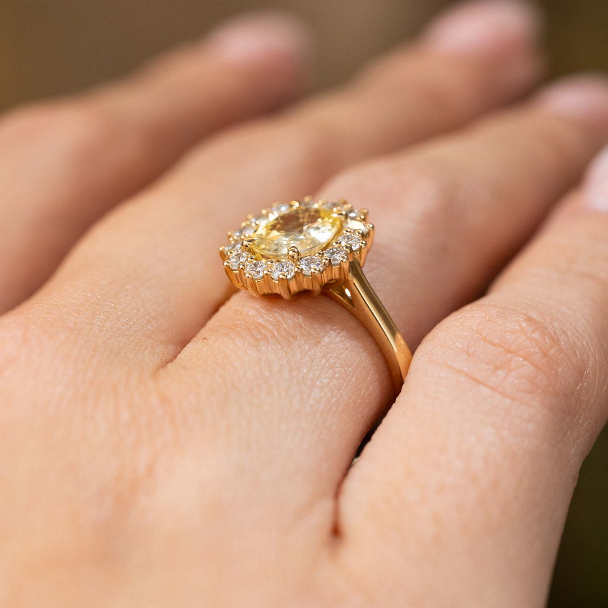 Antique-inspired, yellow sapphire and diamond cluster engagement ring