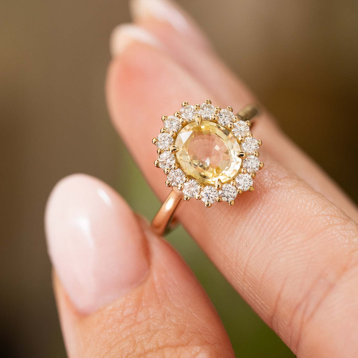 Antique-inspired, yellow sapphire and diamond cluster engagement ring