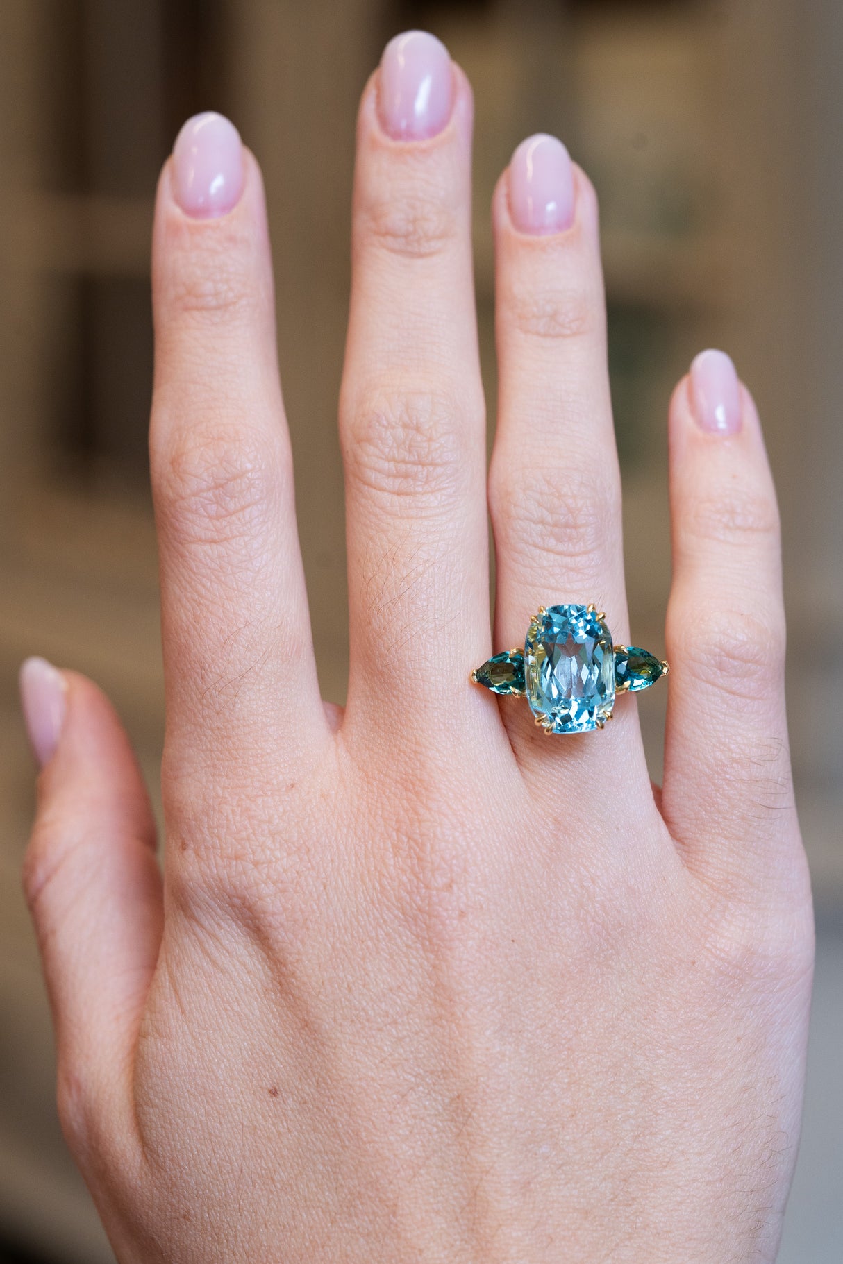 Aquamarine and sea-green tourmaline three-stone cocktail ring