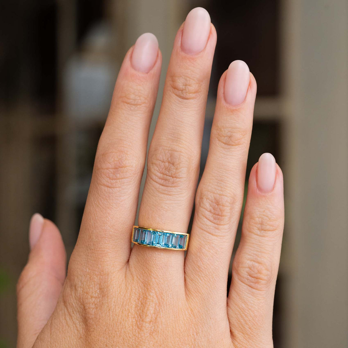 Vintage, 1980s Swiss blue topaz half eternity ring