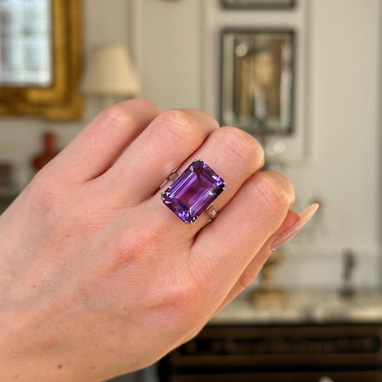 Vintage, Art Deco amethyst cocktail ring worn on closed hand.