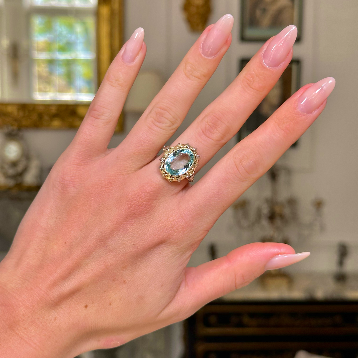 Antique, sea-green aquamarine ring with intricate mount