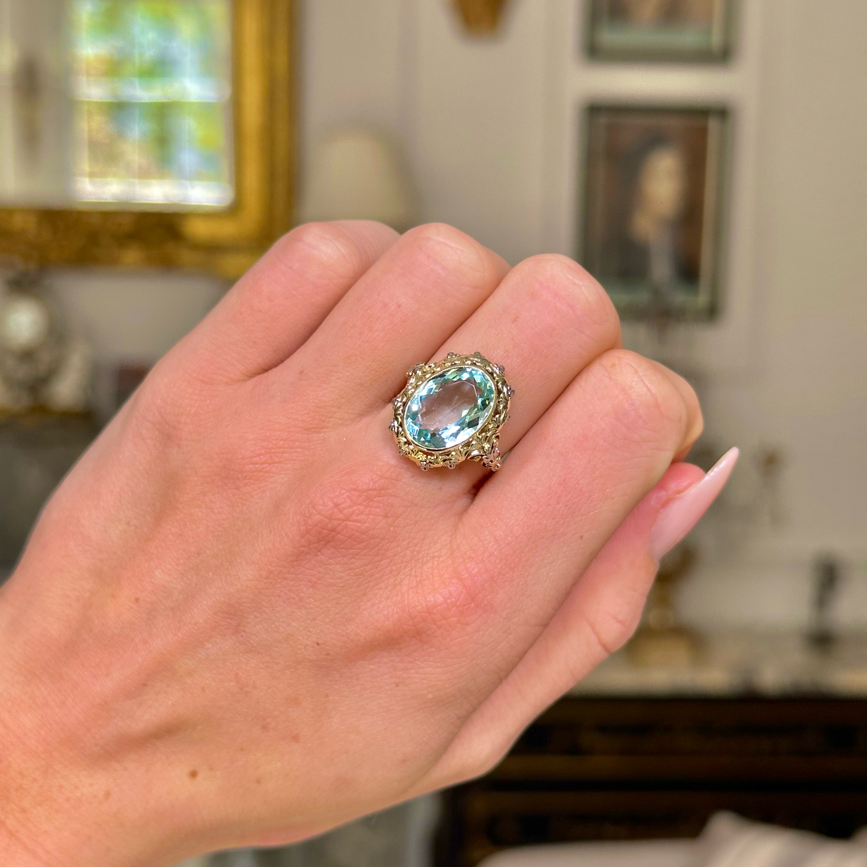 Antique, sea-green aquamarine ring with intricate mount