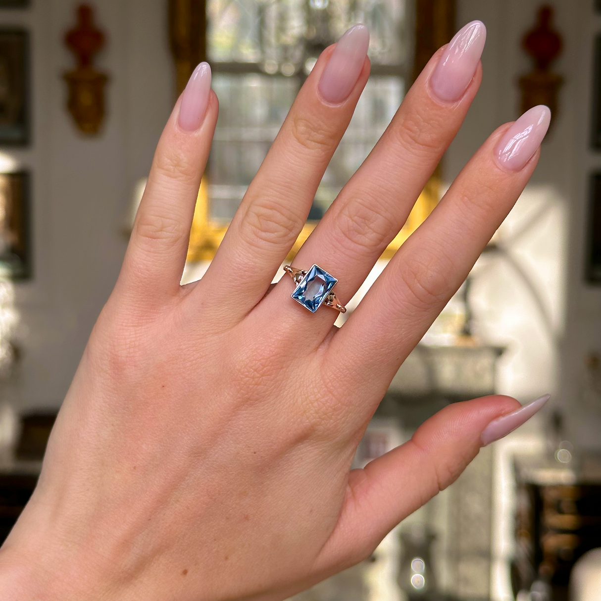 antique aquamarine single stone ring worn on hand