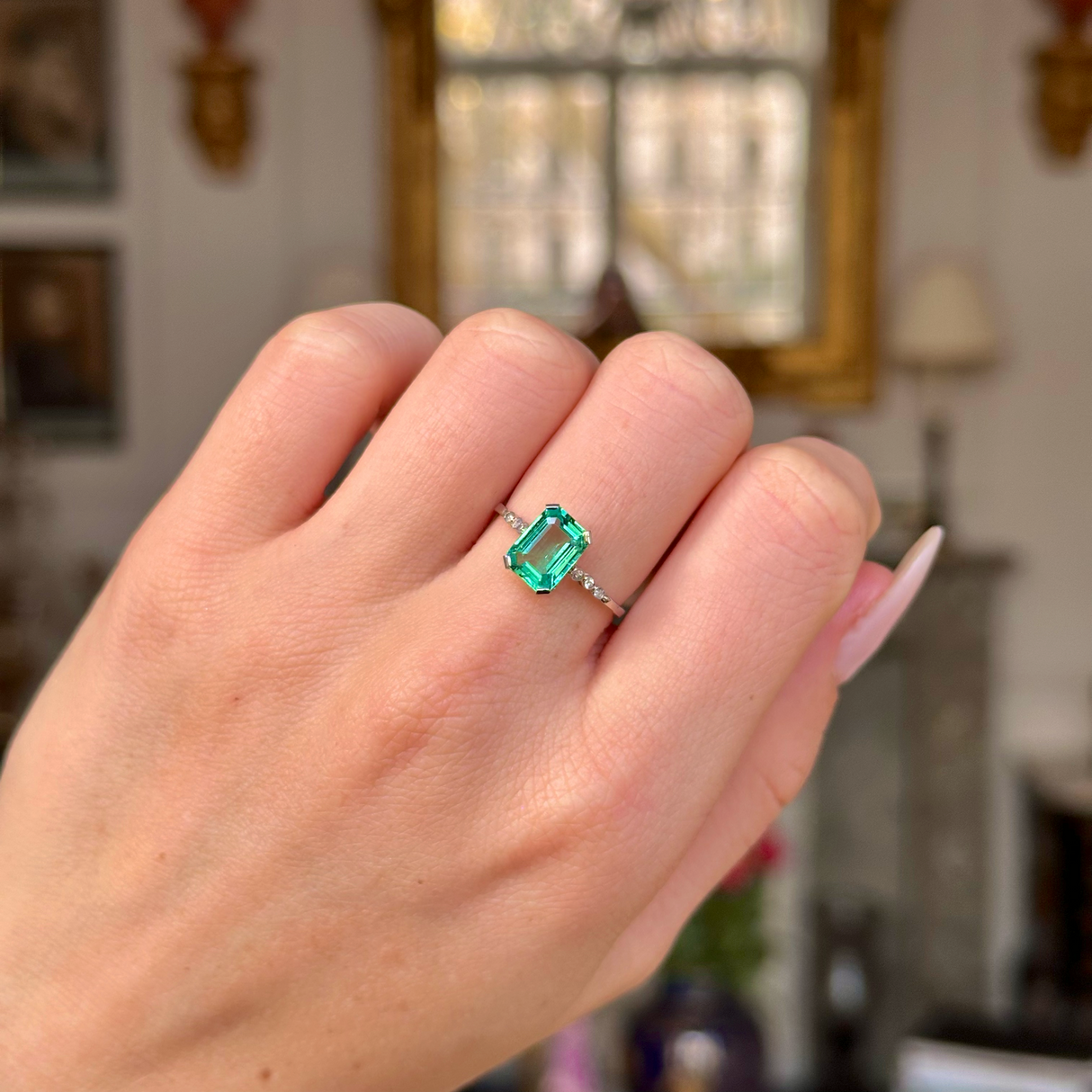 Edwardian single stone ring worn on closed hand.