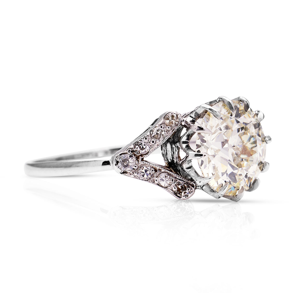 Antique, 2.2ct round-cut diamond solitaire engagement ring, platinum
