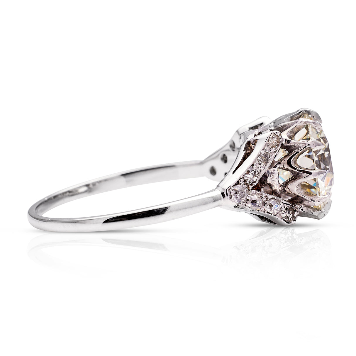 Antique, 2.2ct round-cut diamond solitaire engagement ring, platinum