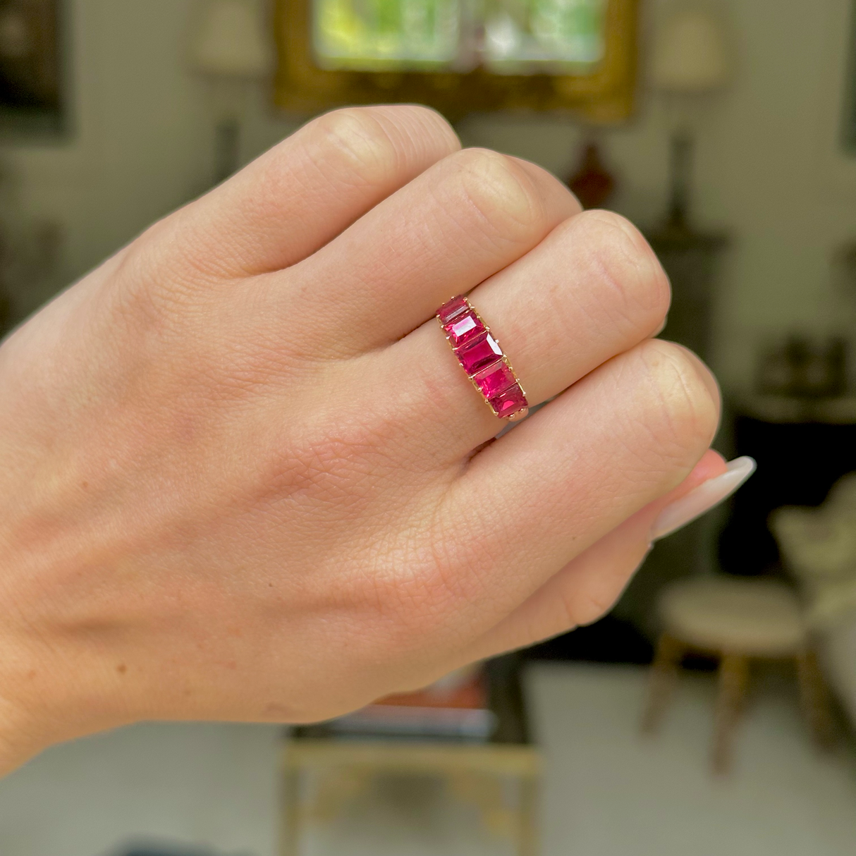 Antique spinel half hoop ring, worn on hand.