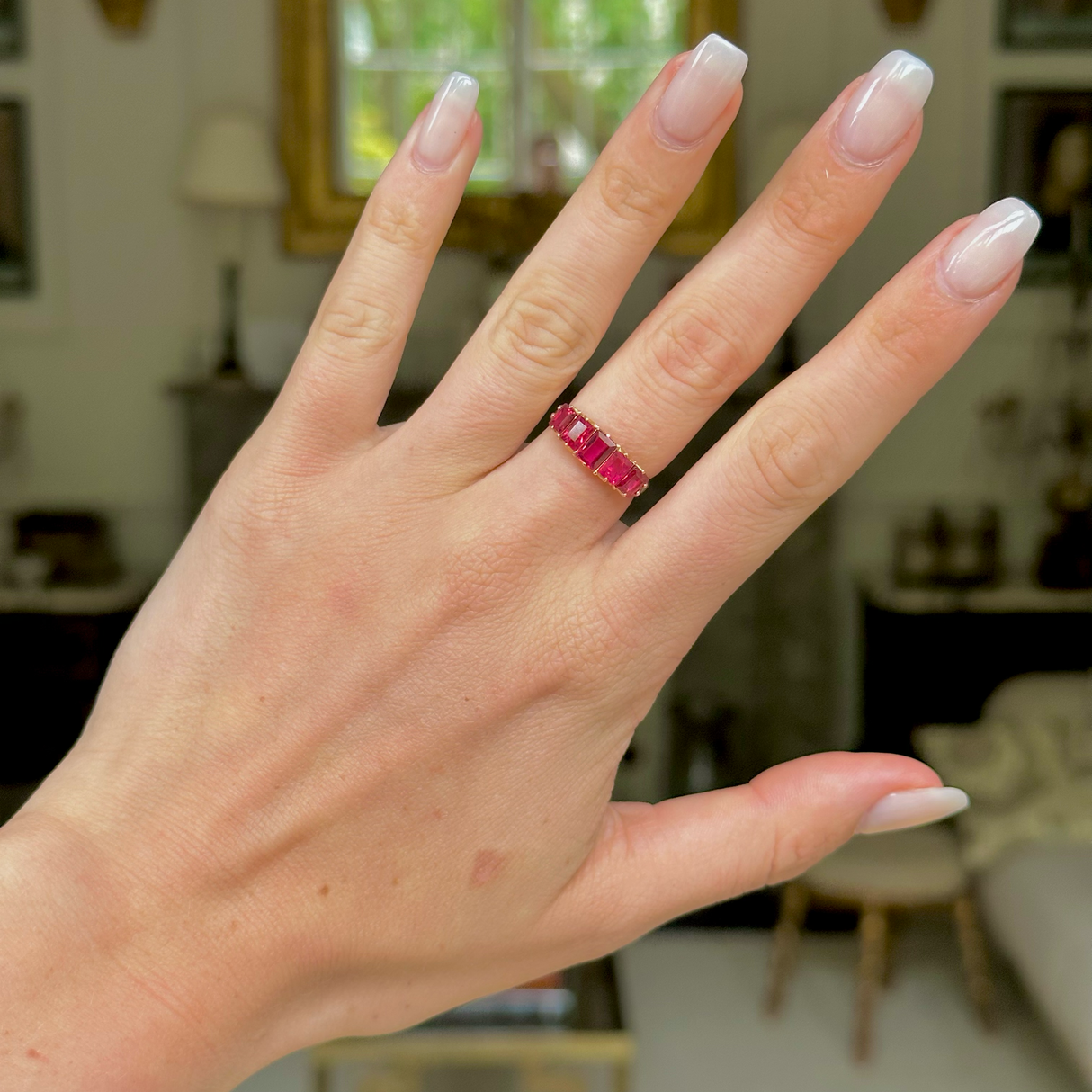 Antique spinel half hoop ring, worn on hand.