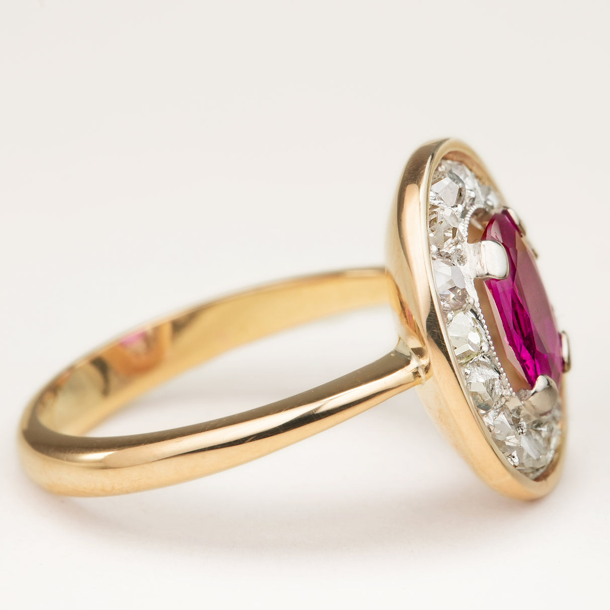 Antique, French, oval-cut ruby & diamond cluster ring