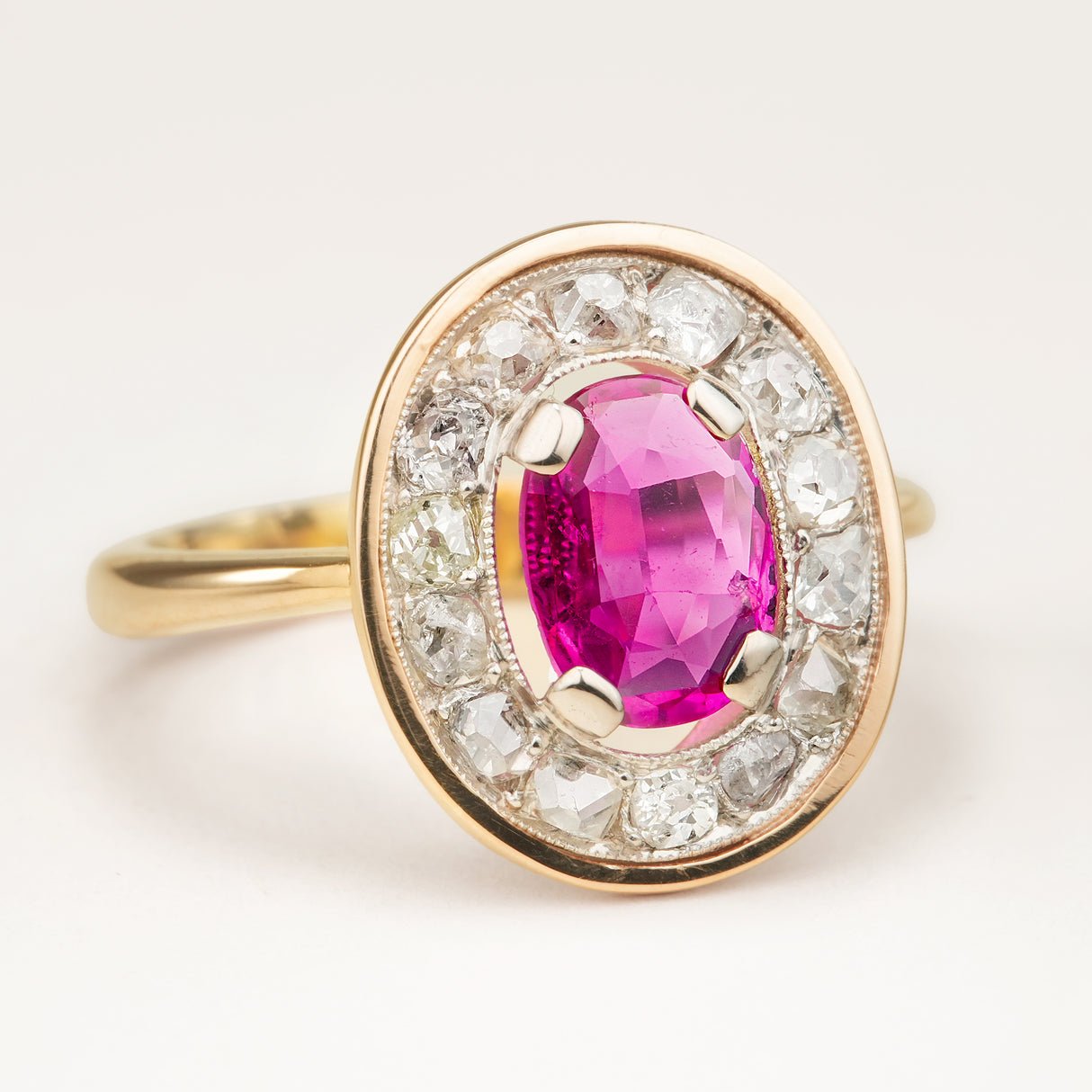 Antique, French, oval-cut ruby & diamond cluster ring