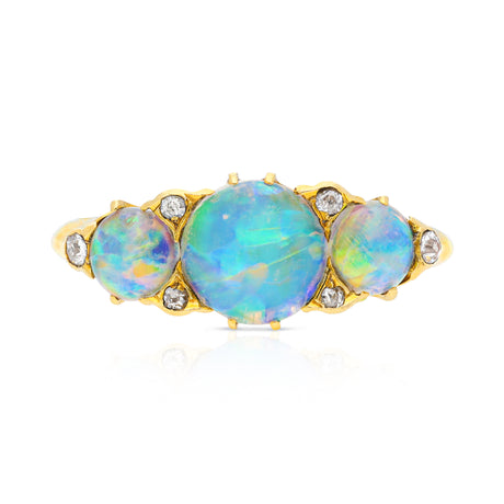 Opal and diamond three stone ring, front view. 
