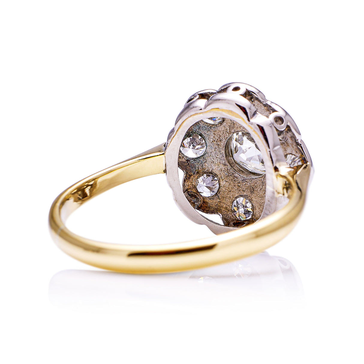 antique diamond daisy cluster engagement ring, side view.