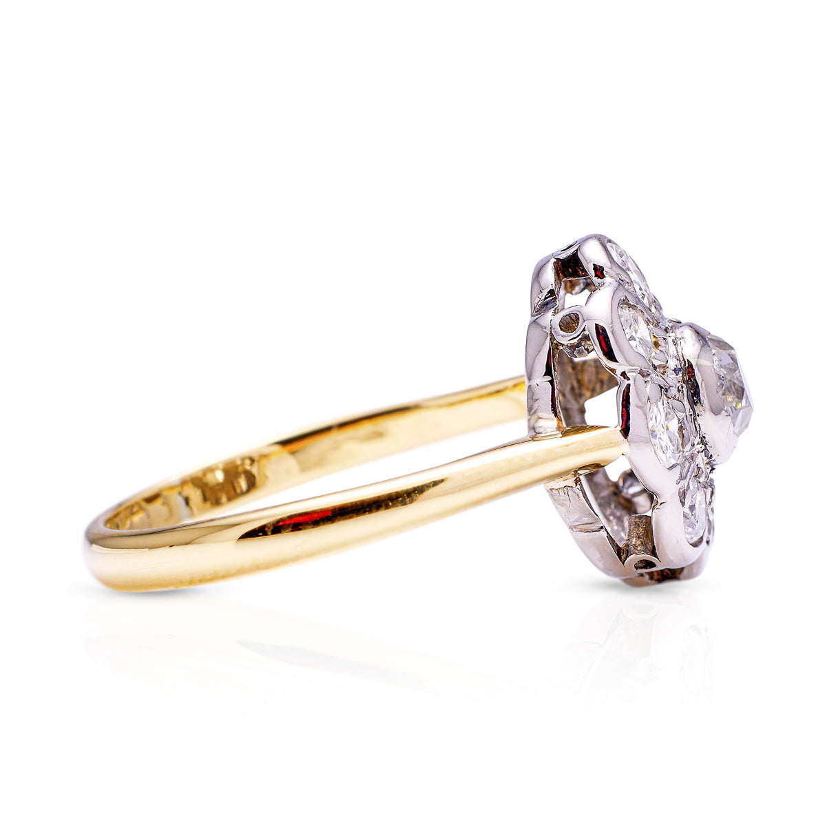 antique diamond daisy cluster engagement ring, side view.