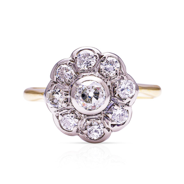 antique diamond daisy cluster engagement ring, front view.
