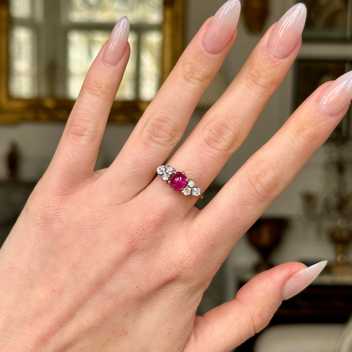 Antique, Edwardian Cabochon Ruby and Diamond Ring, worn on hand.