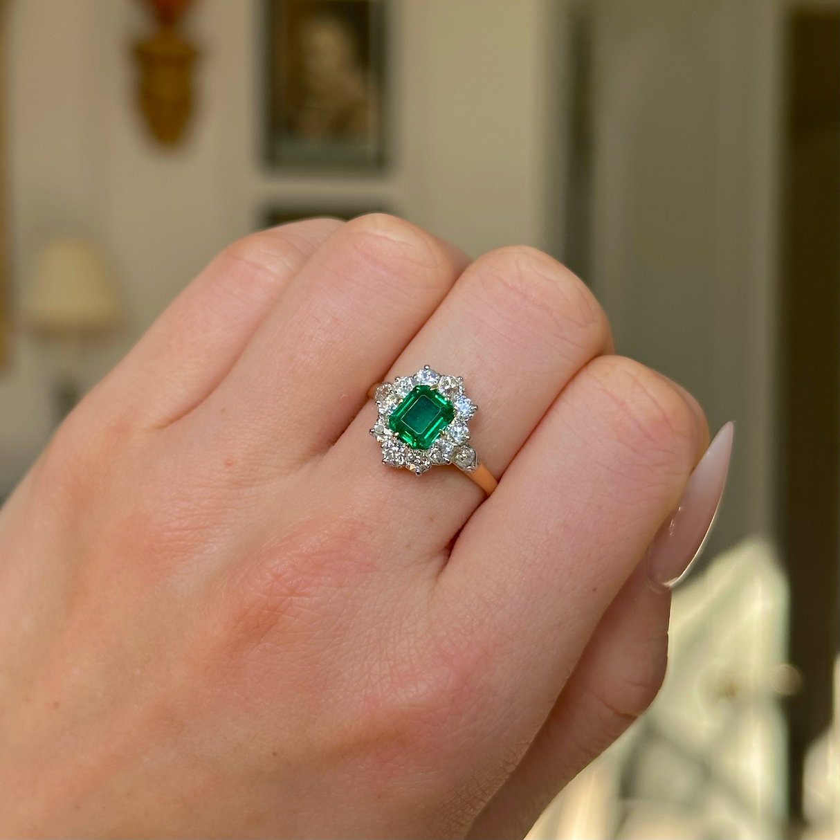 Antique, Edwardian Emerald and Diamond Engagement Ring, 18ct Yellow Gold and Platinum worn on closed hand