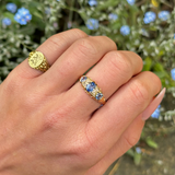 Antique, Edwardian Sapphire and Diamond Three-Stone Engagement Ring, 18ct Yellow Gold worn on hand.