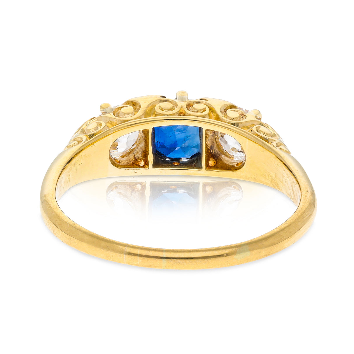 Antique, Edwardian, sapphire and diamond, carved three stone engagement ring, 18ct yellow gold