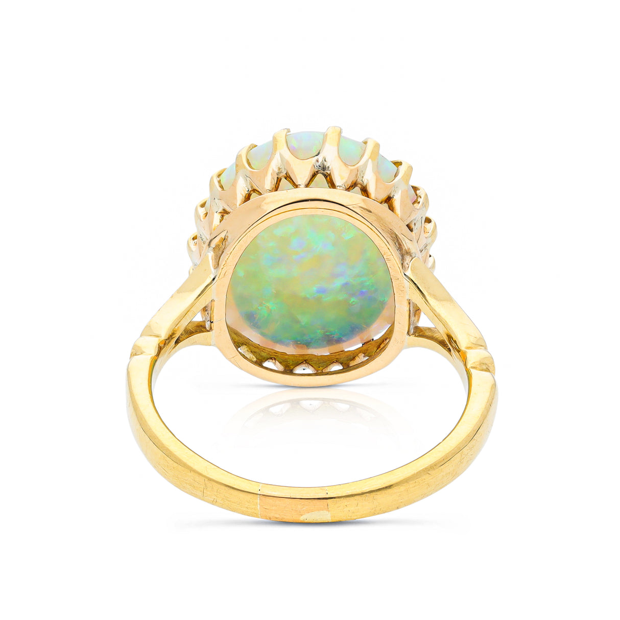 cabochon white opal cocktail ring with 18ct yellow gold band, back view.