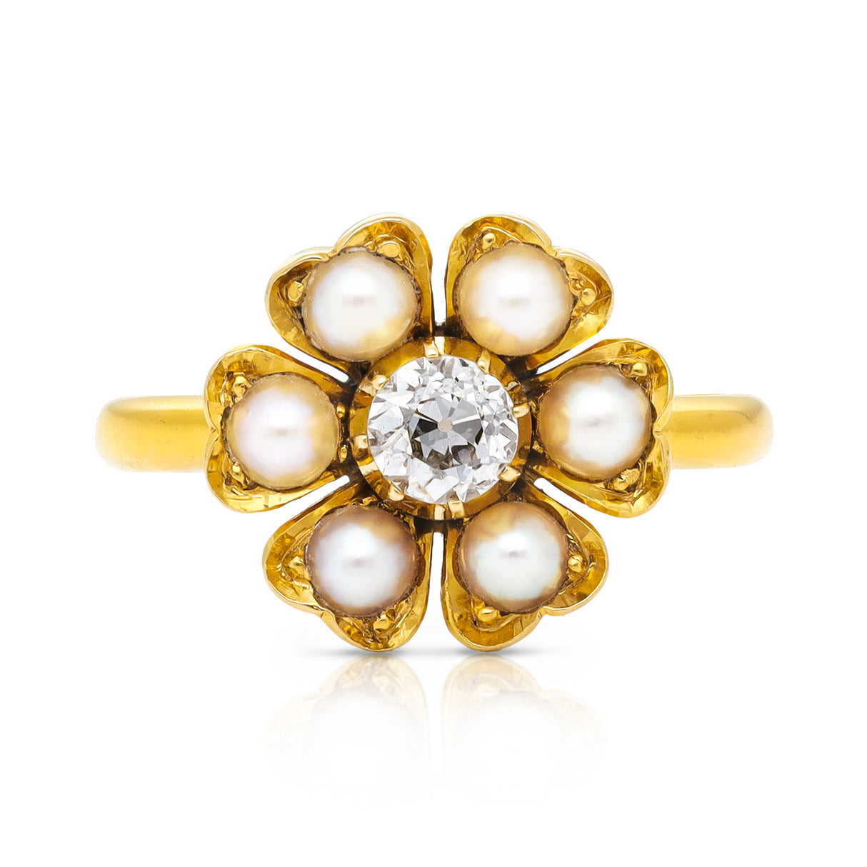 Antique old-cut diamond surrounded by pearls, 18ct yellow gold