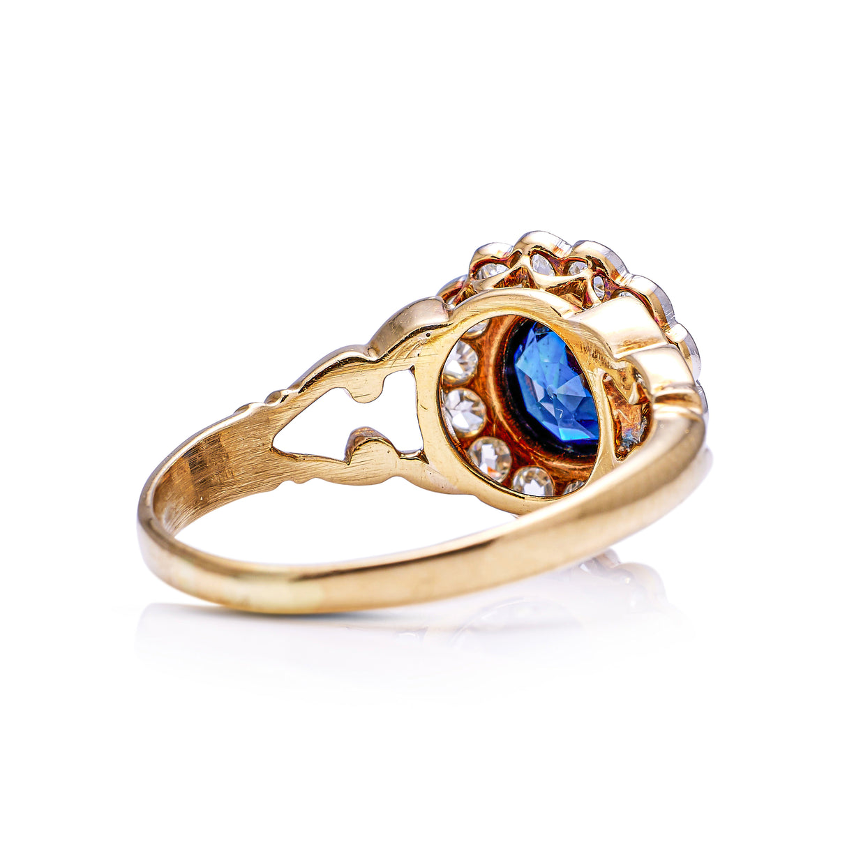 Antique sapphire diamond cluster ring, back view.