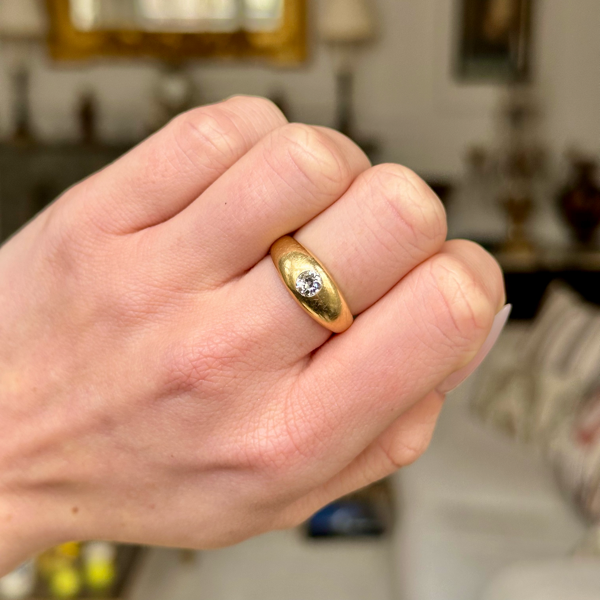 Antique, Single-Stone Diamond Gypsy Ring, worn on closed hand.