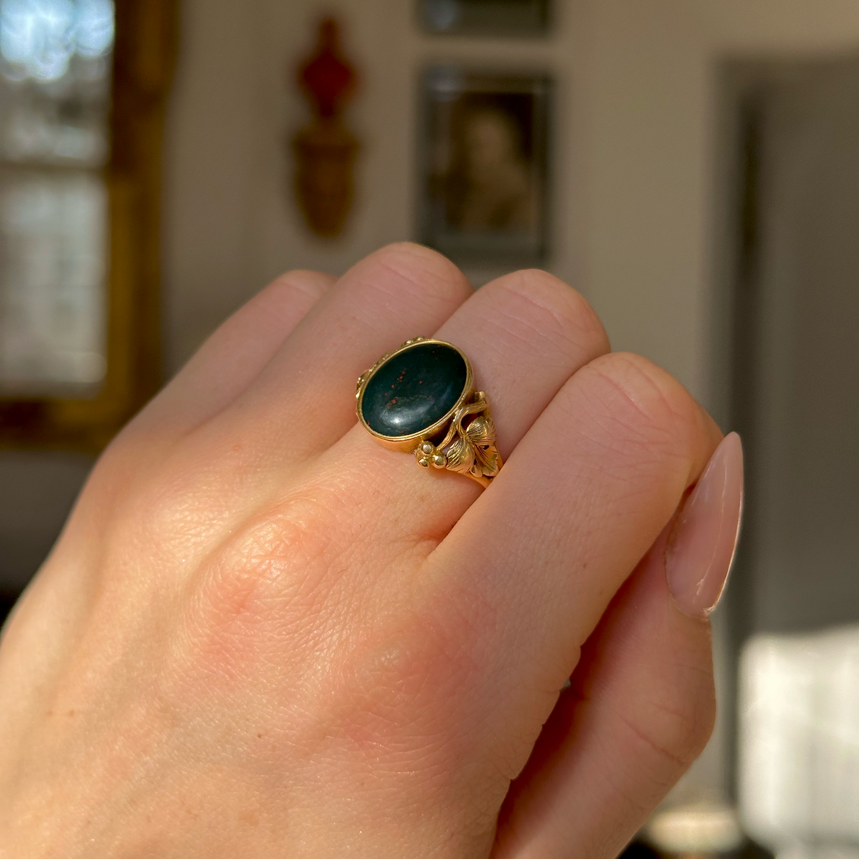 Antique, Victorian Bloodstone Signet Ring, 18ct Yellow Gold worn on closed hand. 