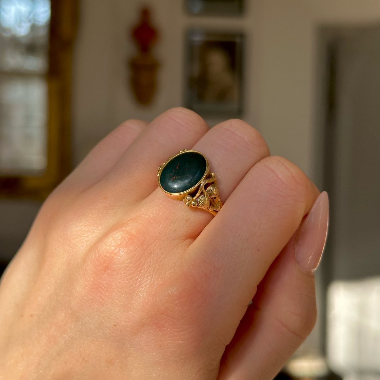 Antique, Victorian Bloodstone Signet Ring, 18ct Yellow Gold worn on closed hand.