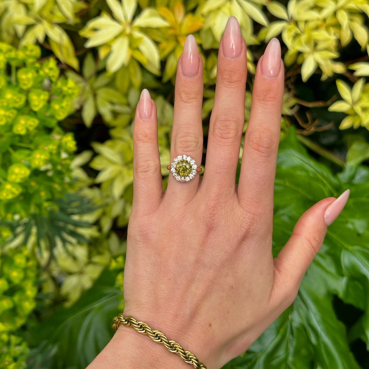 Antique, Victorian Green Zircon and Diamond Cluster Ring, 18ct Yellow Gold worn on hand.