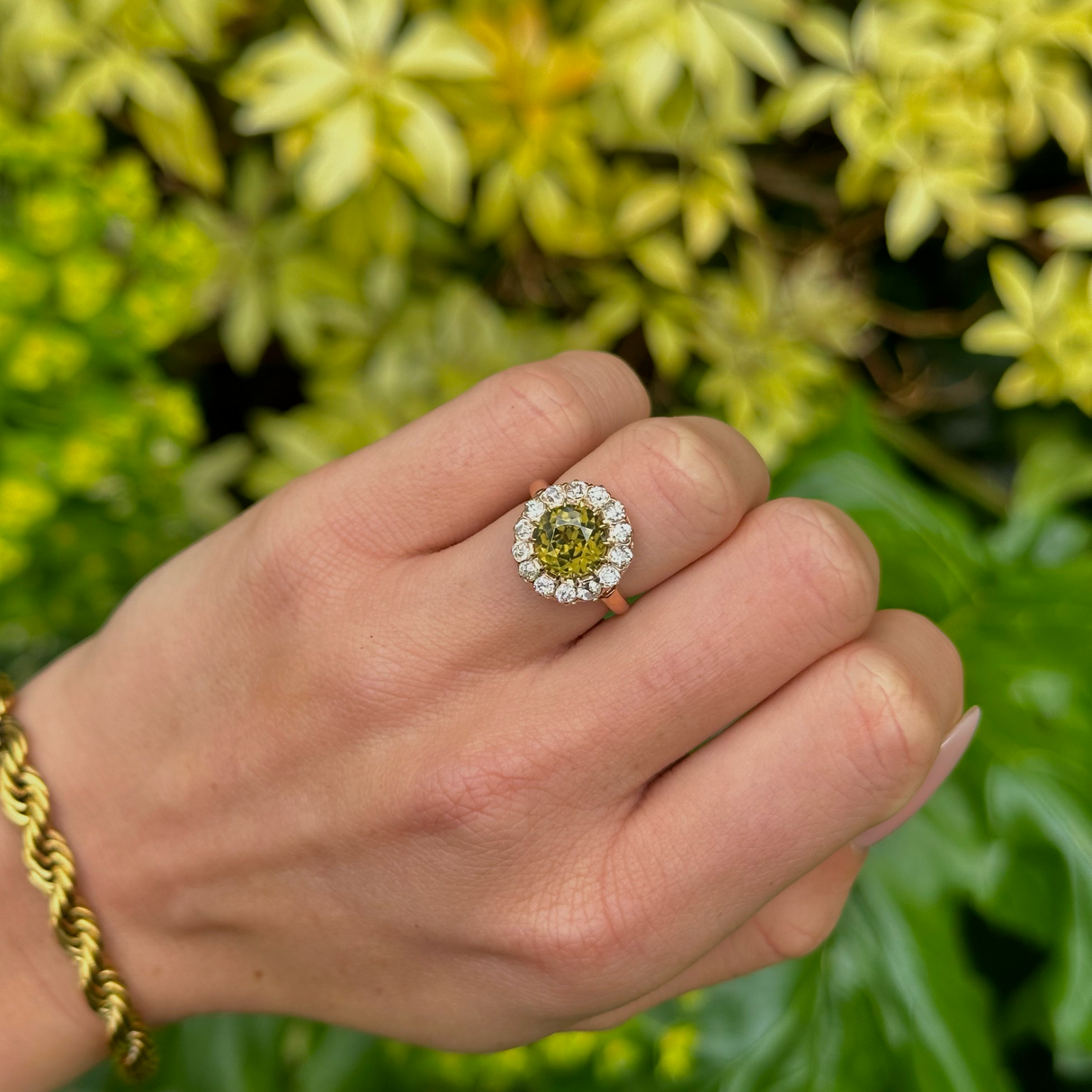 Antique, Victorian Green Zircon and Diamond Cluster Ring, 18ct Yellow Gold worn on hand.