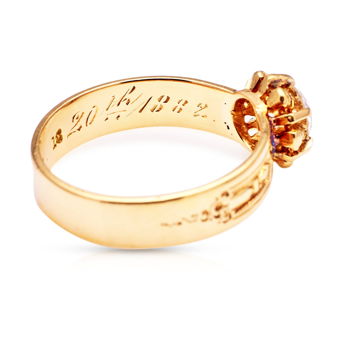 Antique Victorian solitaire diamond ring, top view.