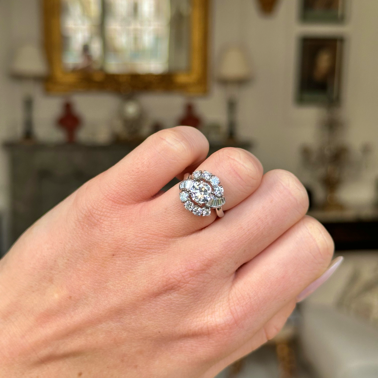 Cartier Diamond Engagement Ring worn on closed hand.