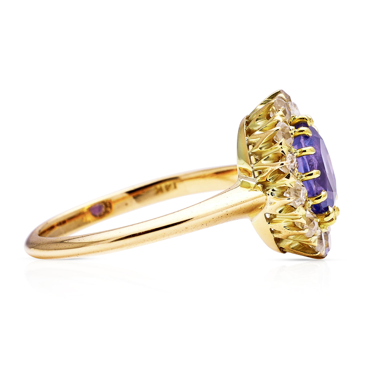 Antique, colour change oval sapphire and diamond cluster engagement ring